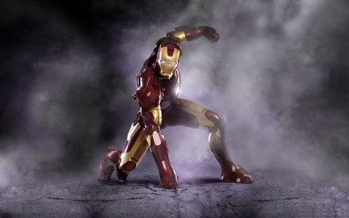 Cool Wallpaper with Iron Man Poses After Landing in the Battle