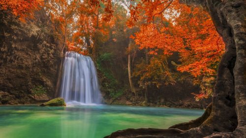HD picture of nature with waterfall on an autumn forest