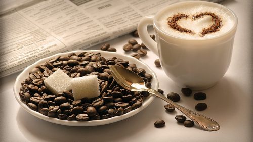 Artistic laptop background with cappuccino coffee wallpaper