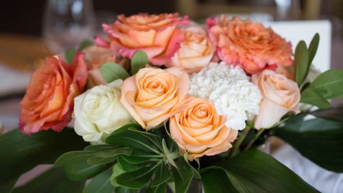Flower Arrangements With Coral and White Roses with Carnations