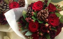Wedding Flower Arrangements with Roses and Pinecones