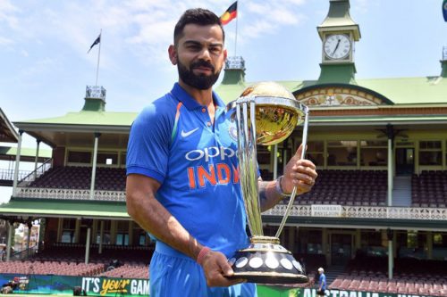 Virat Kohli cricket photo with the ICC Cricket World Cup trophy