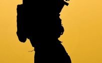 Mobile Phone Wallpaper with Soldier in Silhouette