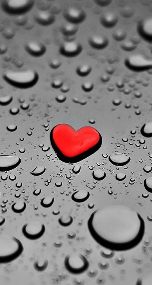 Romantic Phone Wallpaper with 3D Love Sign and Water Drops in Dark Background